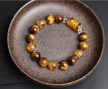Load image into Gallery viewer, Three-Faced Tiger Eye Fortune Bracelet